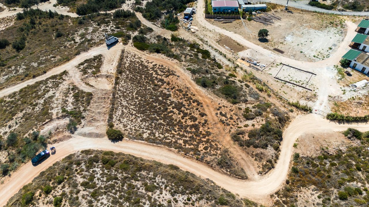 Discover the scenic rural landscape of Çeşme, Turkey, with winding roads and natural terrain.