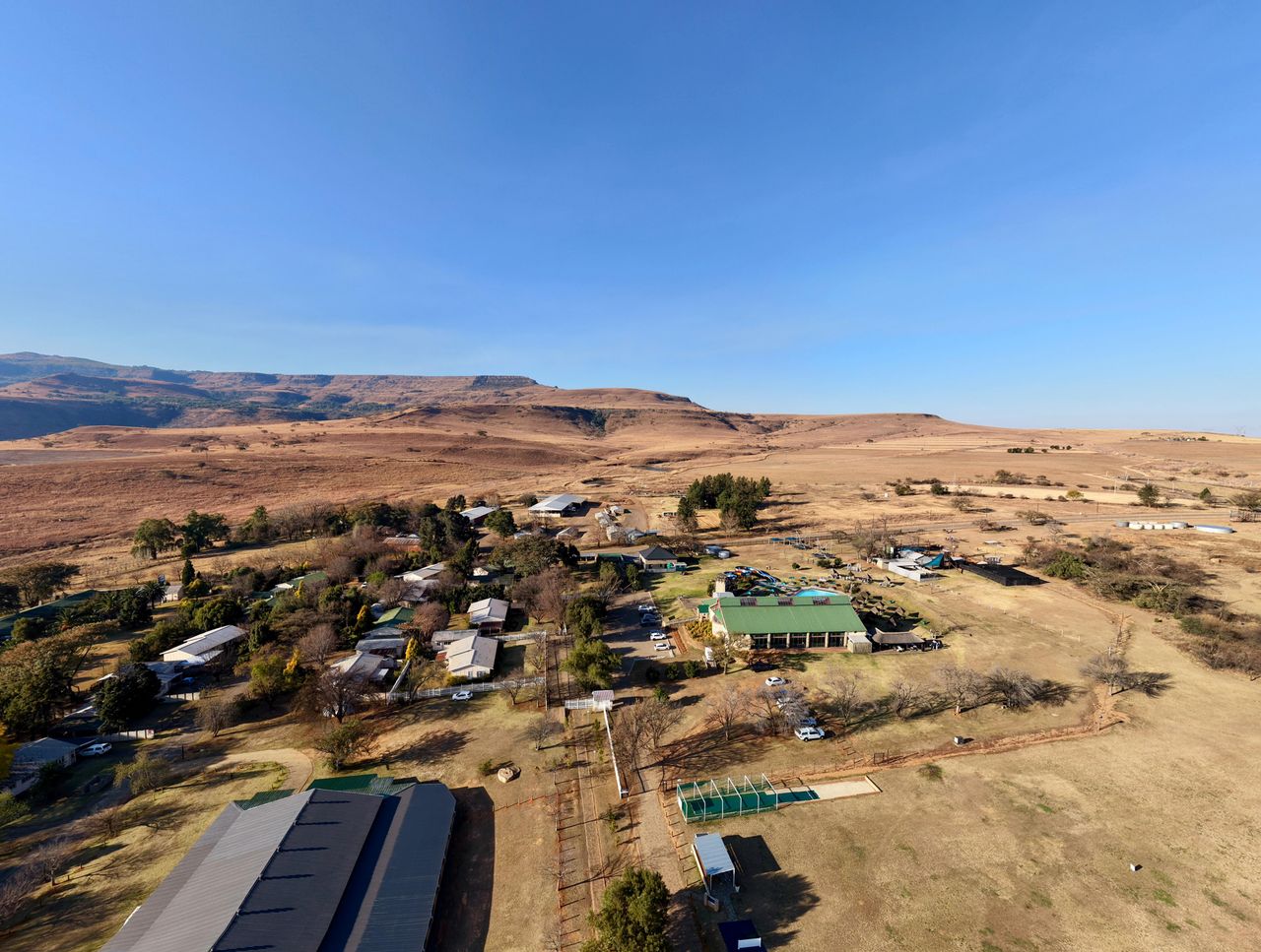 services-02 A stunning aerial view of a rural community landscape in KwaZulu-Natal, South Africa.